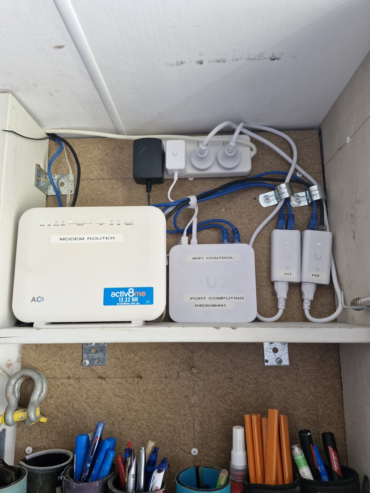 Mesh Wi-Fi, modem and power, neatly mounted